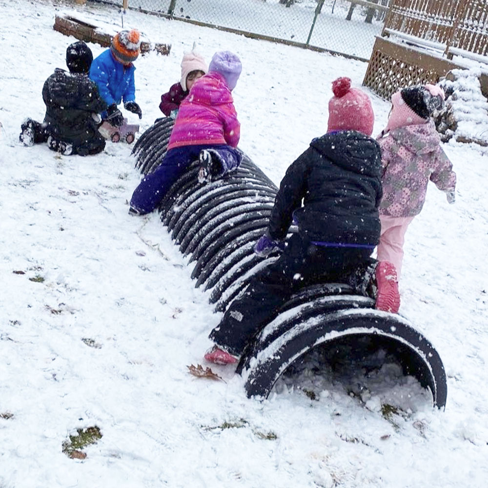 Children playing in the snow at the Jane Norman Child Study Centre, Truro NS